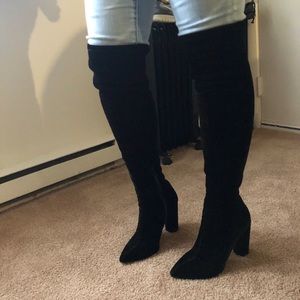 Thigh high velvet high heels.